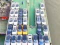Обычная загрузка контейнеровоза новенькими авто